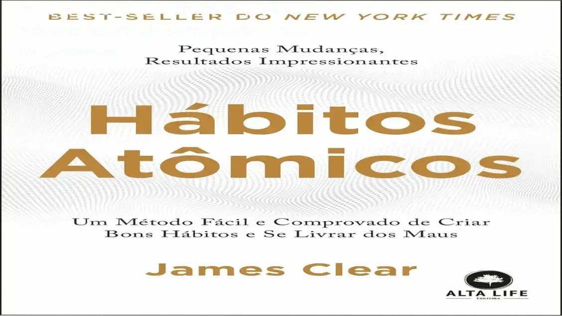 Livro físico Hábitos Atômicos de James Clear aberto mostrando diagramas internos